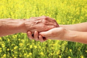 iStock-522798276senior holding hands compressed